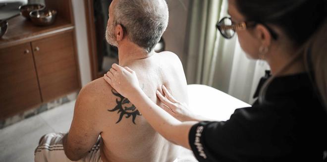 A man is receiving a massage