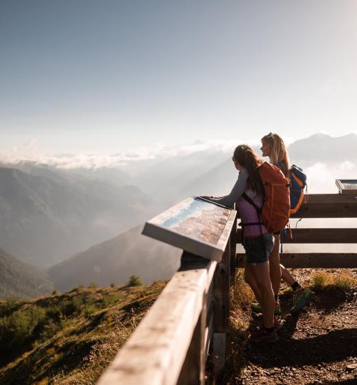 two female hikers on a viewing platform