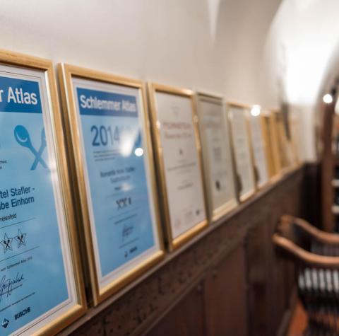 Various framed awards of Hotel Stafler