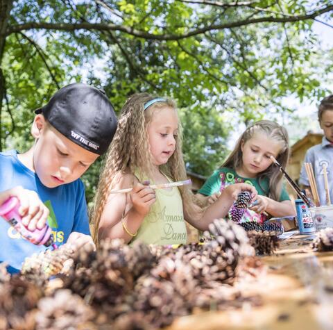 Children are painting with acrylic paints