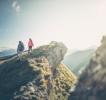 A man and a woman hiking