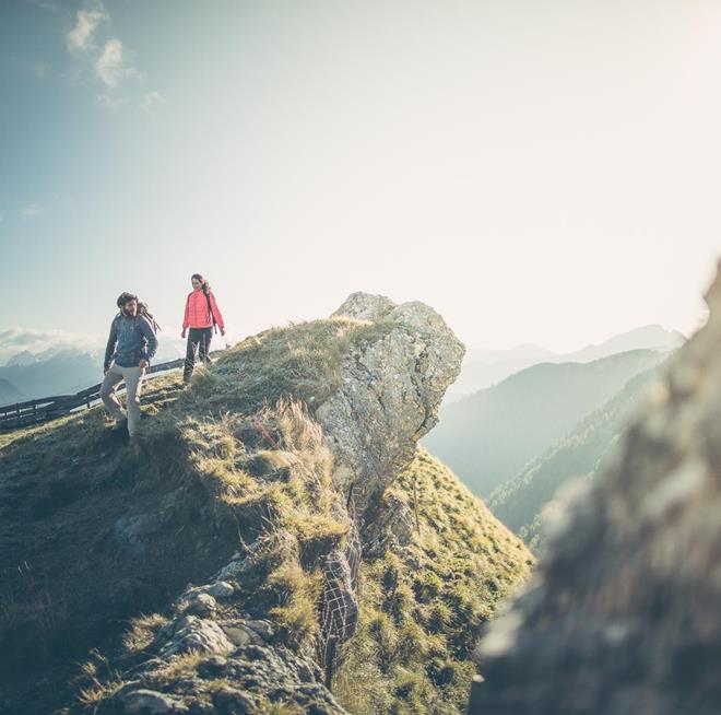 A man and a woman hiking