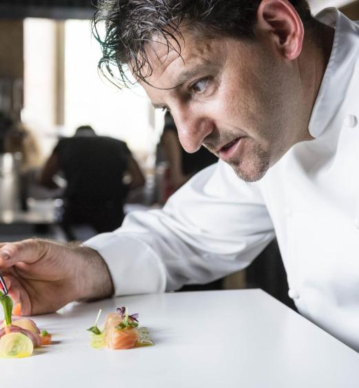 Peter Girtler is preparing a dish