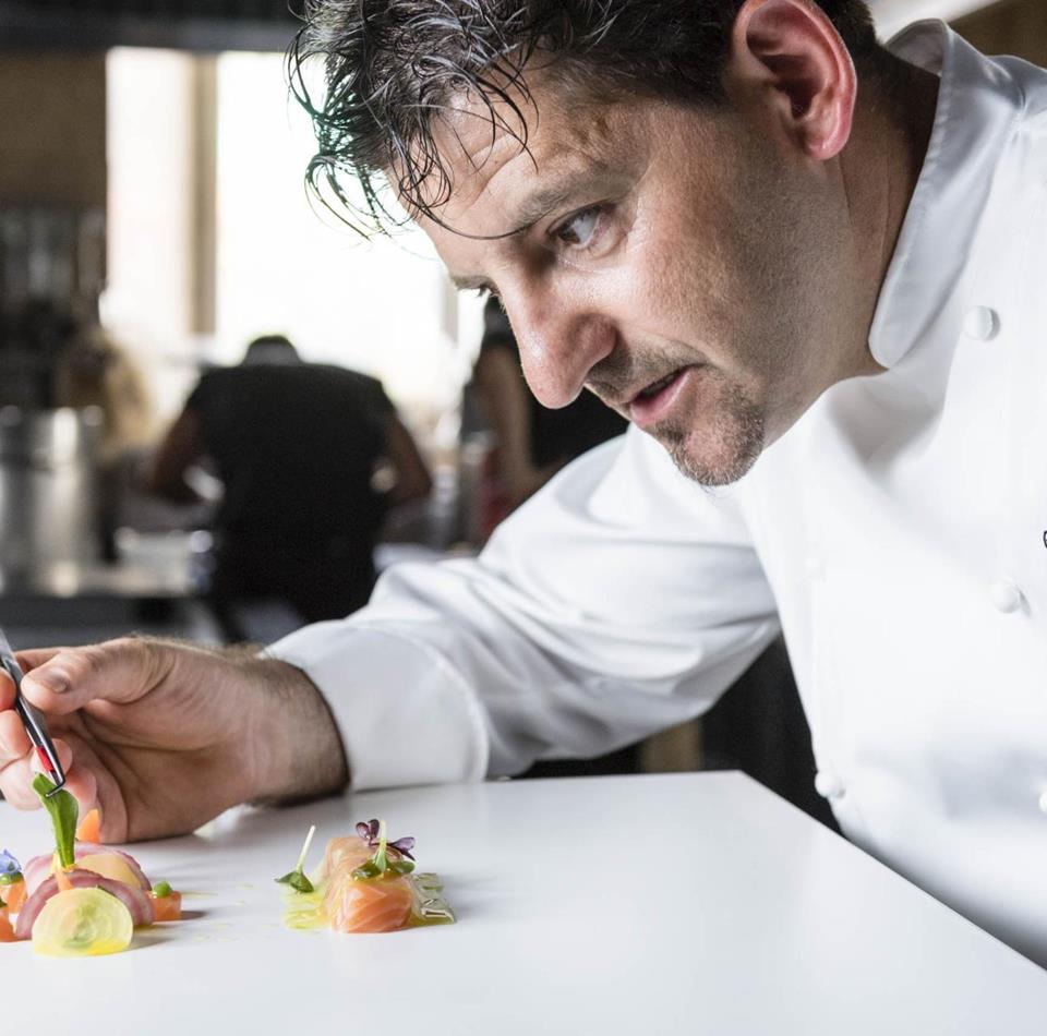 Peter Girtler is preparing a dish