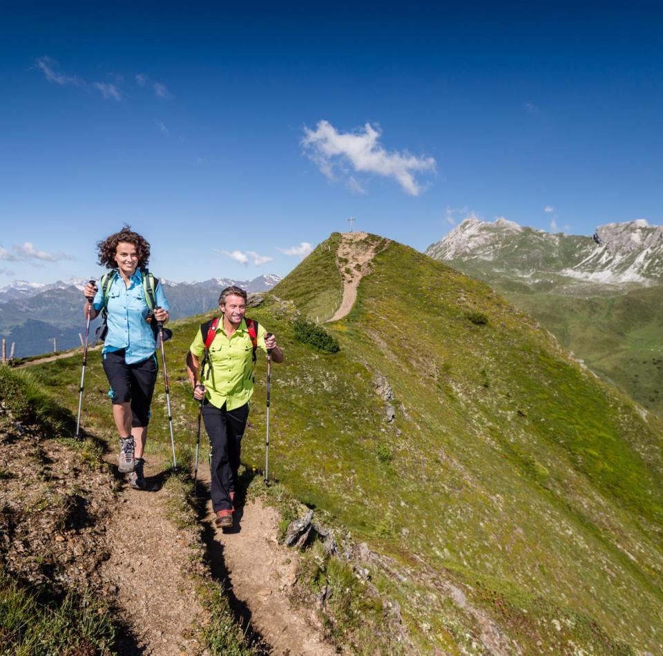 A man and a woman hiking