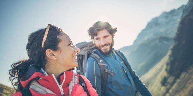 A man and a woman hiking