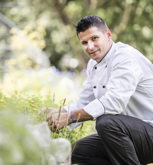 A chef in the herb garden