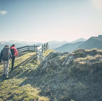 A man and a woman hiking