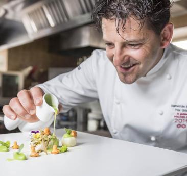 Peter Girtler prepares a dish